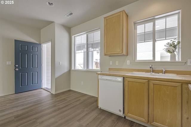 1115 NE 86th Way, Hillsboro, OR 97006 - kitchen with dishwasher, a sink, wood finished floors, light brown cabinetry, and baseboards
