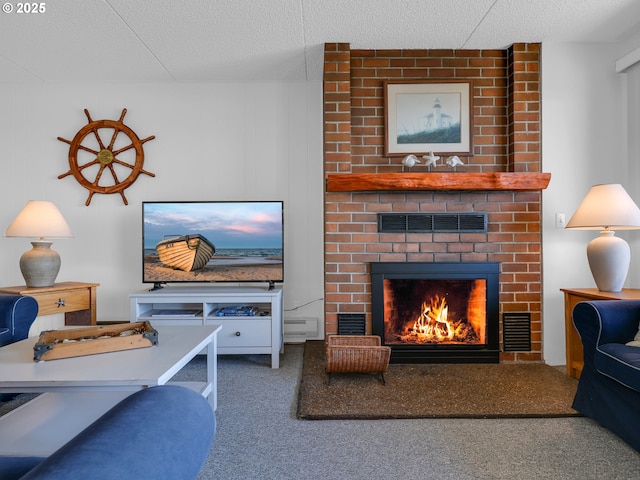 1146 N Marion Ave Unit 628, Gearhart, OR 97138 - living area with carpet flooring, a fireplace, and a textured ceiling