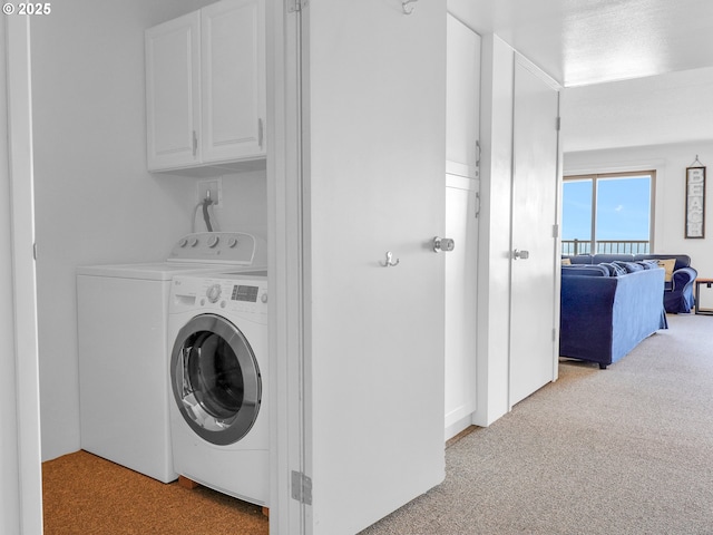 1146 N Marion Ave Unit 628, Gearhart, OR 97138 - washroom with carpet floors, cabinet space, and separate washer and dryer