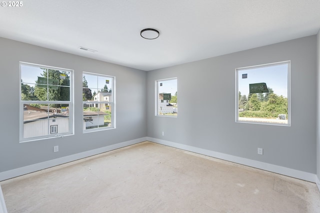 4410 NE 55th Way, Vancouver, WA 98661 - spare room featuring baseboards and concrete flooring
