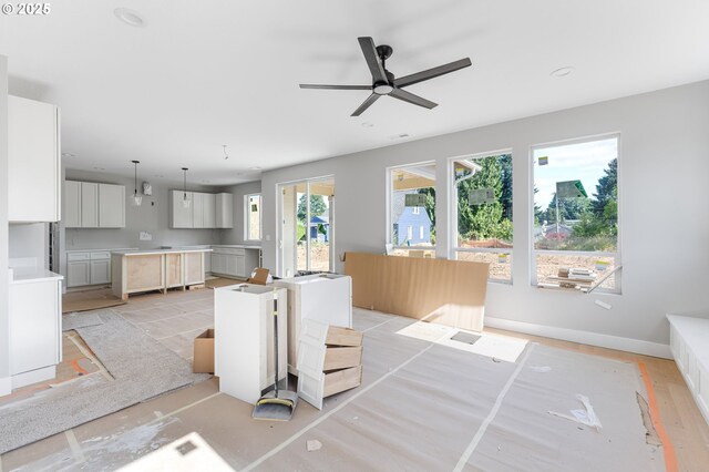 4410 NE 55th Way, Vancouver, WA 98661 - kitchen with a ceiling fan, hanging light fixtures, white cabinetry, and recessed lighting