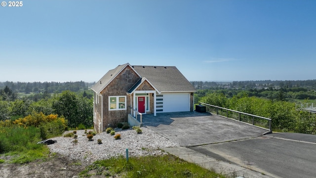 1790 Thompson Falls Dr, Seaside, OR 97138 - view of front facade with driveway, stone siding, and a view of trees