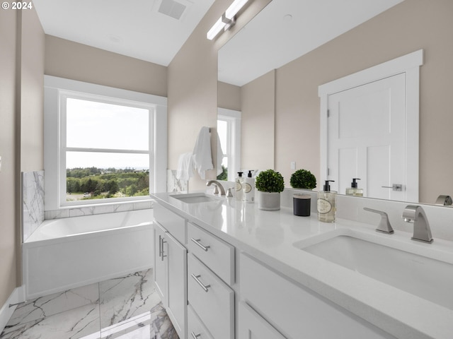 1790 Thompson Falls Dr, Seaside, OR 97138 - full bath featuring double vanity, marble finish floors, and a garden tub
