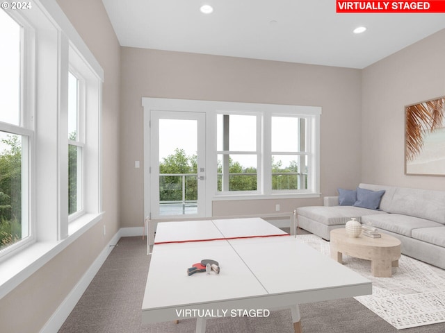 1790 Thompson Falls Dr, Seaside, OR 97138 - carpeted living area with plenty of natural light and recessed lighting