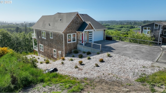 1790 Thompson Falls Dr, Seaside, OR 97138 - view of front facade featuring roof with shingles and driveway