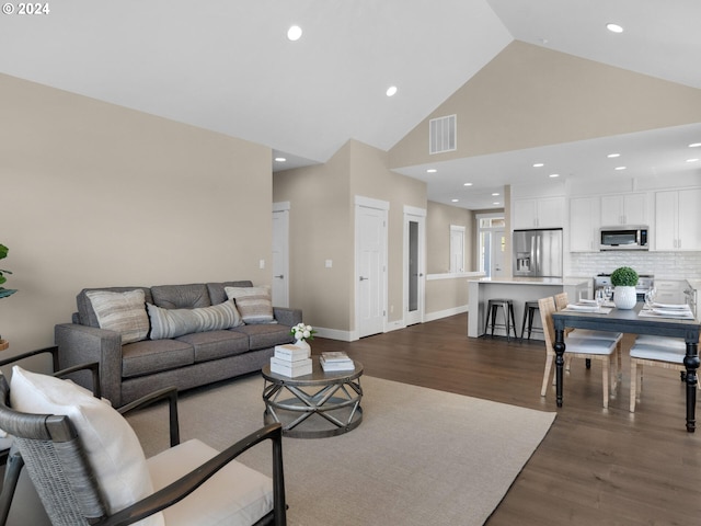 1790 Thompson Falls Dr, Seaside, OR 97138 - living area with high vaulted ceiling, dark wood-type flooring, and recessed lighting