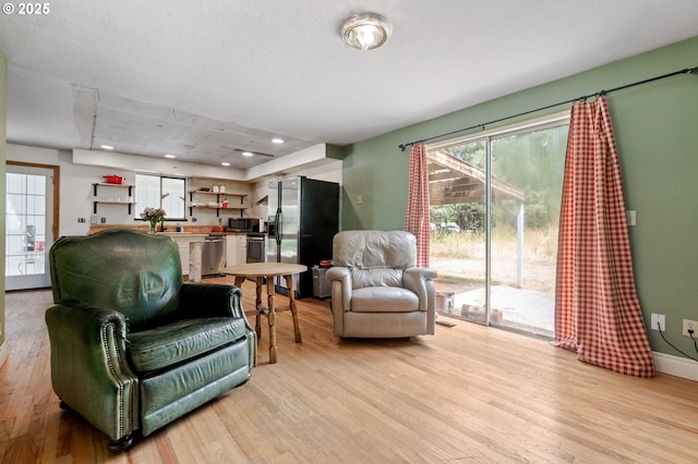 22224 S Kamrath Rd, Oregon City, OR 97045 - living area featuring light wood-type flooring and recessed lighting
