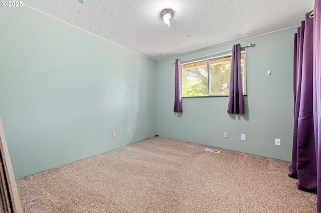22224 S Kamrath Rd, Oregon City, OR 97045 - carpeted spare room featuring a textured ceiling