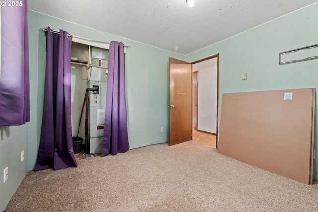 22224 S Kamrath Rd, Oregon City, OR 97045 - unfurnished bedroom featuring carpet and a textured ceiling