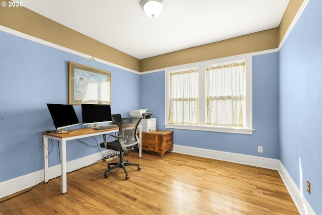 office area featuring wood finished floors and baseboards