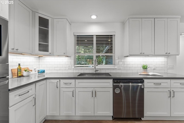 4992 Prospect St, West Linn, OR 97068 - kitchen featuring dishwasher, recessed lighting, tasteful backsplash, glass insert cabinets, and white cabinetry
