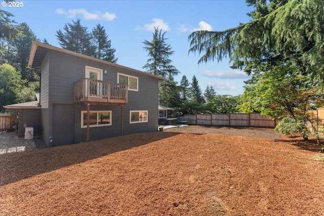 4992 Prospect St, West Linn, OR 97068 - rear view of property featuring a fenced backyard and a balcony
