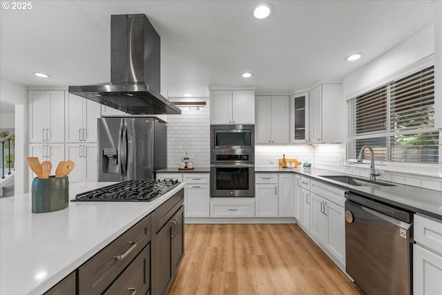 4992 Prospect St, West Linn, OR 97068 - kitchen featuring appliances with stainless steel finishes, range hood, white cabinets, and recessed lighting