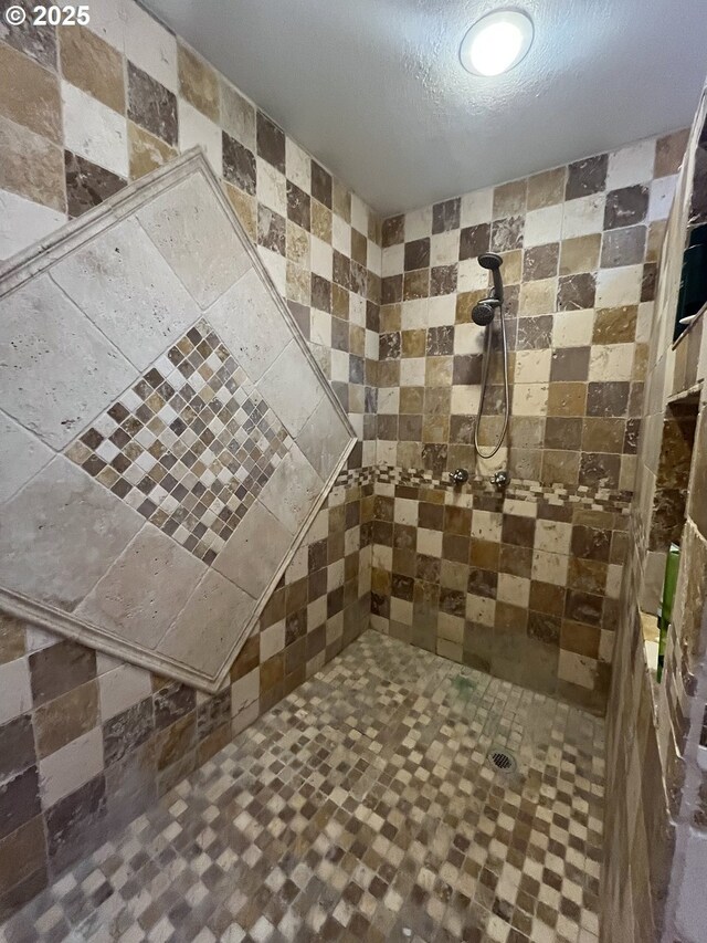 full bath featuring toilet, tile walls, and a sink