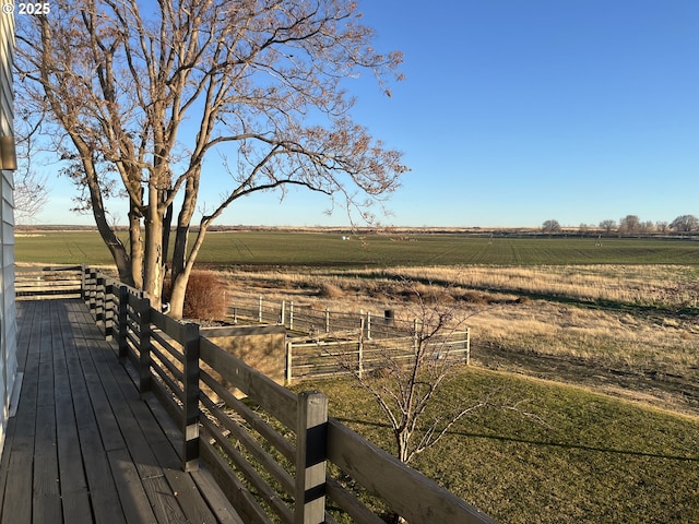 view of yard with a rural view
