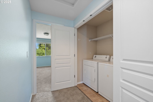 8465 S Hollyhock St, Rockaway Beach, OR 97136 - washroom with washer and dryer and light carpet
