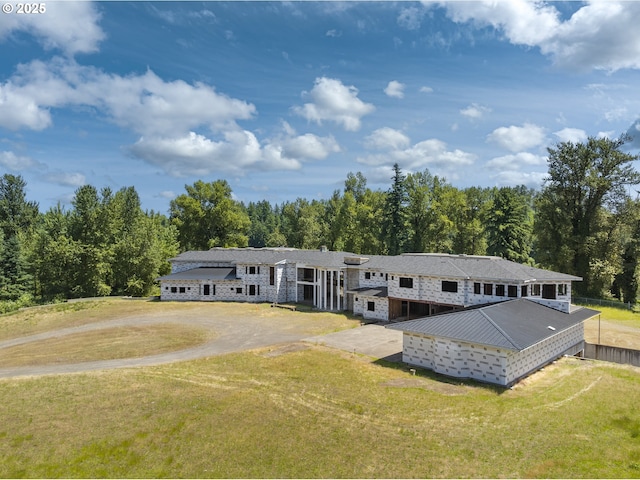 32088 SW Peach Cove Rd, West Linn, OR 97068 - view of front of house with a front lawn and a view of trees
