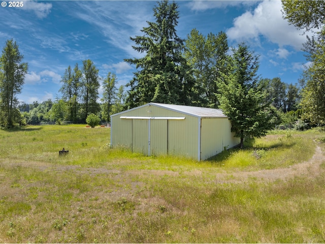 32088 SW Peach Cove Rd, West Linn, OR 97068 - view of yard with an outbuilding, an outdoor structure, and a detached garage