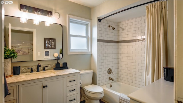 bathroom with shower / bath combo, vanity, and toilet