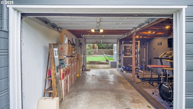 garage featuring a garage door opener