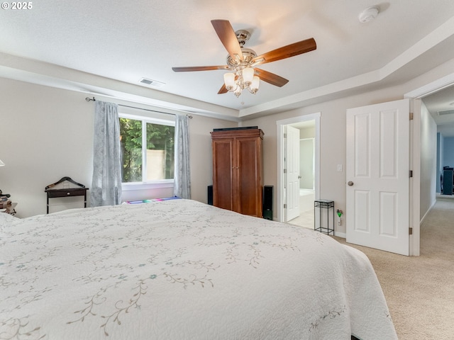21390 SW Roellich Ave, Sherwood, OR 97140 - bedroom with light colored carpet, ceiling fan, ensuite bath, and baseboards