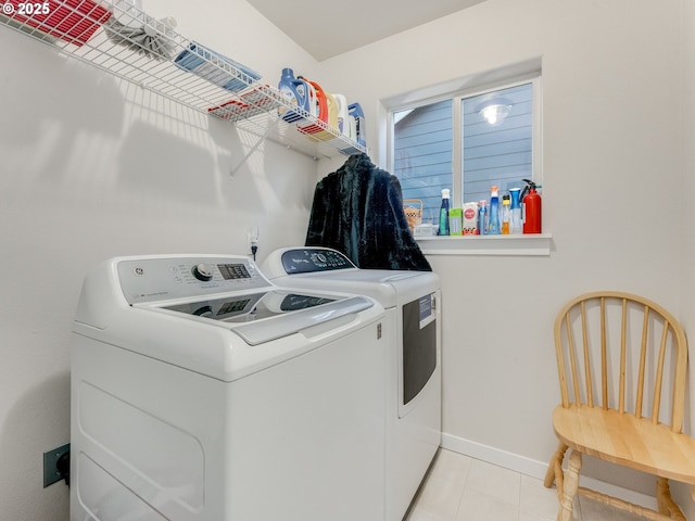 21390 SW Roellich Ave, Sherwood, OR 97140 - laundry area with separate washer and dryer, baseboards, and light tile patterned floors