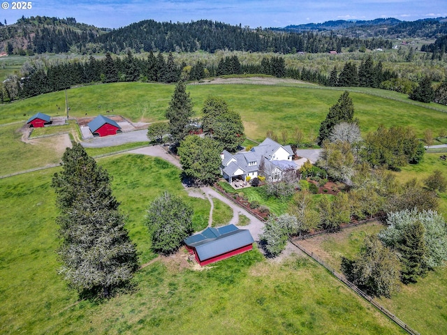 bird's eye view with a rural view and a forest view
