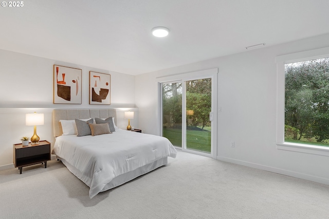 bedroom with baseboards, carpet floors, visible vents, and access to outside