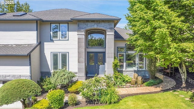9459 SE Tarnahan Dr, Happy Valley, OR 97086 - view of front of property with stone siding and roof with shingles