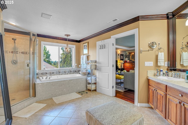 9459 SE Tarnahan Dr, Happy Valley, OR 97086 - bathroom with a bath, tile patterned flooring, a shower stall, vanity, and crown molding