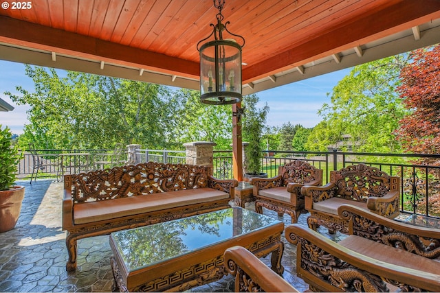 9459 SE Tarnahan Dr, Happy Valley, OR 97086 - view of patio / terrace with an outdoor hangout area and view of wooded area