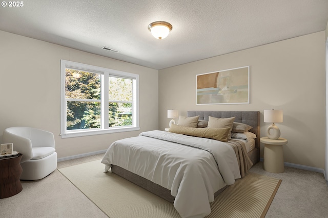 9459 SE Tarnahan Dr, Happy Valley, OR 97086 - bedroom featuring carpet, baseboards, and a textured ceiling