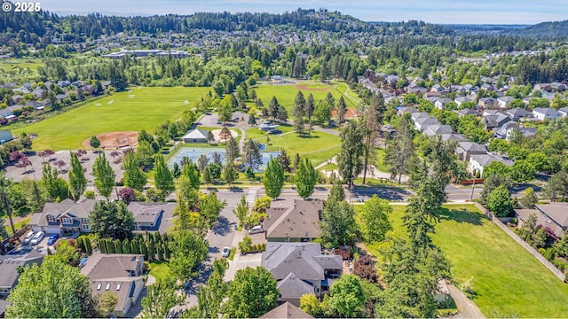 9459 SE Tarnahan Dr, Happy Valley, OR 97086 - aerial view of residential area with a heavily wooded area