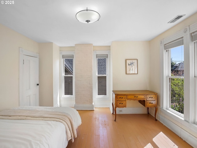 131 NE Tillamook St, Portland, OR 97212 - bedroom with baseboards and light wood finished floors