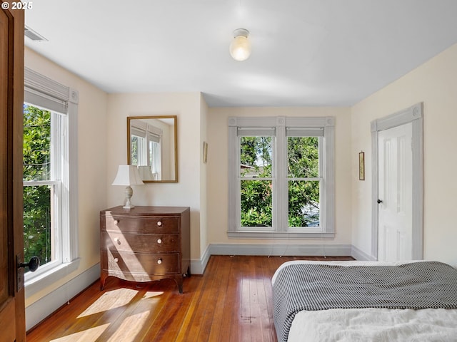 131 NE Tillamook St, Portland, OR 97212 - bedroom with baseboards and wood-type flooring
