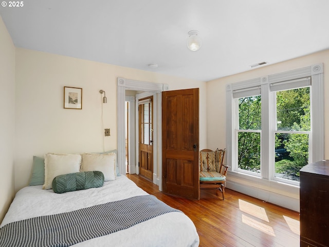 131 NE Tillamook St, Portland, OR 97212 - bedroom with multiple windows and hardwood / wood-style floors