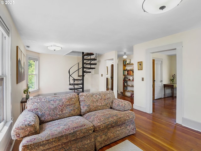 131 NE Tillamook St, Portland, OR 97212 - living room with wood finished floors, stairs, and baseboards