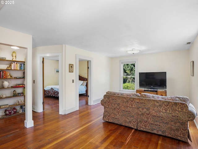 131 NE Tillamook St, Portland, OR 97212 - living room with wood-type flooring and baseboards
