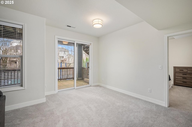 view of carpeted spare room