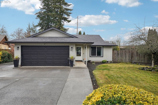 single story home with a garage and a front lawn