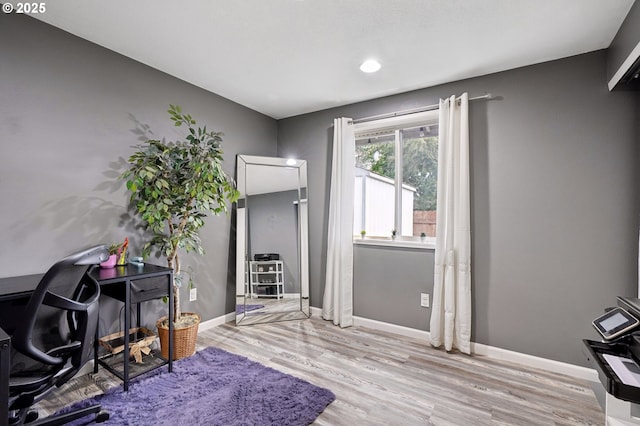 home office featuring light hardwood / wood-style floors