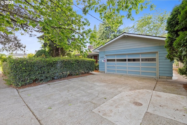 245 NE 4th Ave, Hillsboro, OR 97124 - garage with concrete driveway