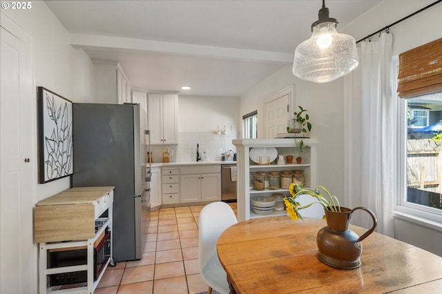 909 NE Brazee St Unit 16, Portland, OR 97212 - dining space with light tile patterned flooring and recessed lighting