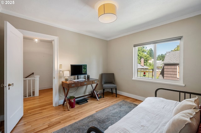 909 NE Brazee St Unit 16, Portland, OR 97212 - bedroom with crown molding and wood finished floors