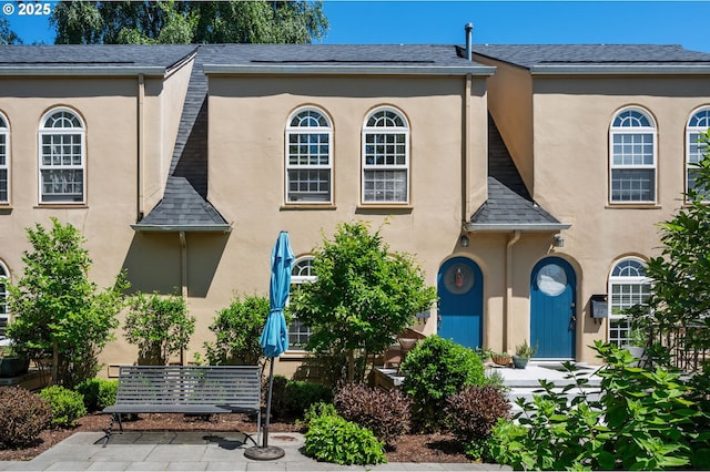 909 NE Brazee St Unit 16, Portland, OR 97212 - townhome / multi-family property with stucco siding and a patio