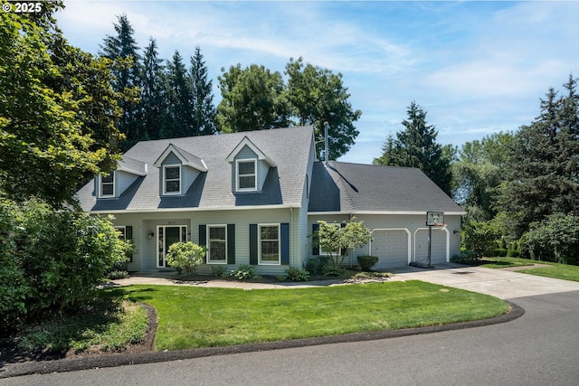 cape cod-style house with a garage and a front lawn