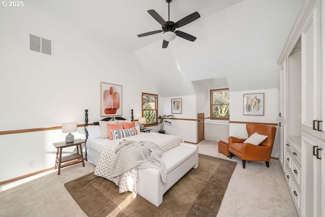 bedroom featuring ceiling fan, light carpet, and lofted ceiling