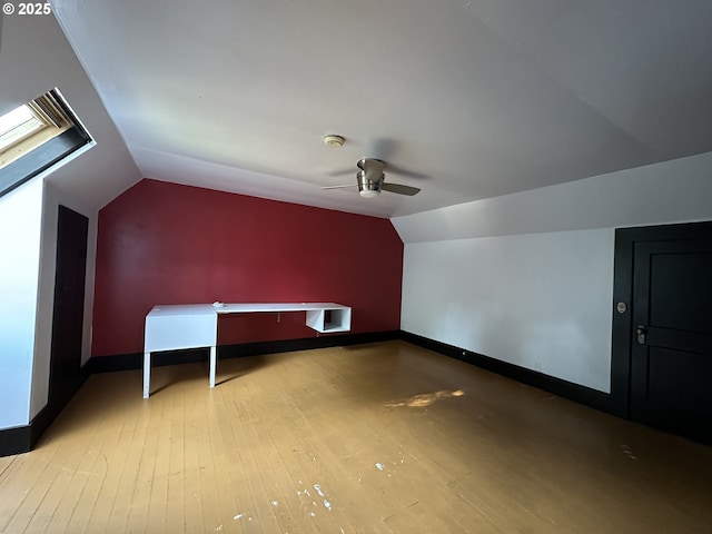 212 NW Bridge St, John Day, OR 97845 - bonus room with lofted ceiling, hardwood / wood-style flooring, baseboards, and ceiling fan