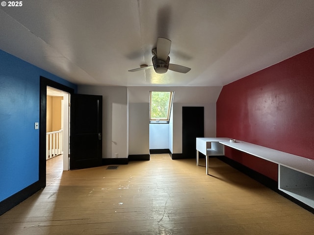 212 NW Bridge St, John Day, OR 97845 - additional living space featuring hardwood / wood-style floors, a ceiling fan, and baseboards