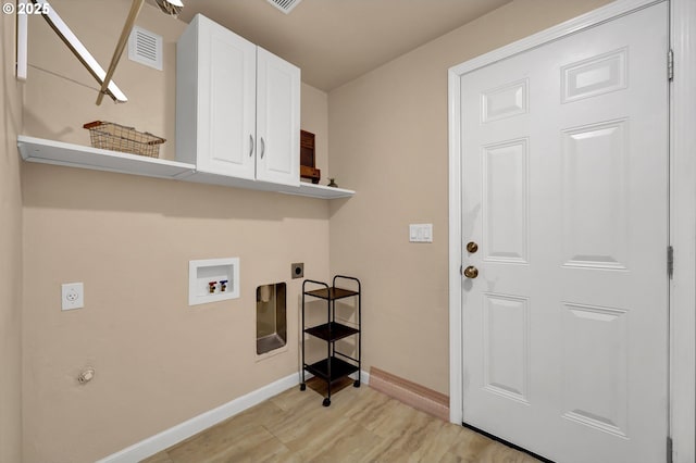 1364 Goodpasture Island Rd, Eugene, OR 97401 - washroom featuring cabinet space, electric dryer hookup, washer hookup, baseboards, and light wood-style floors